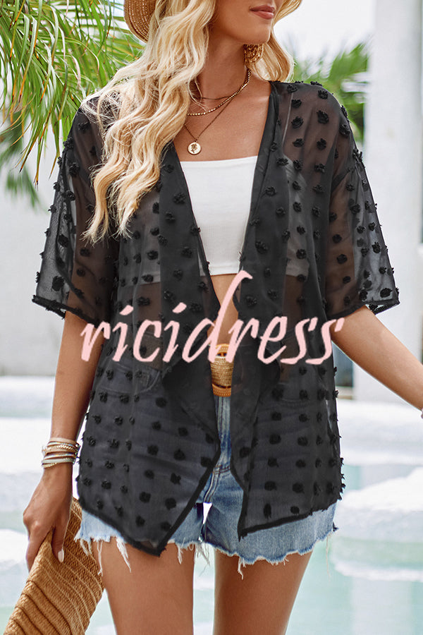 durchsichtiger Überwurf mit Patchwork-Pom-Pom-Ärmeln