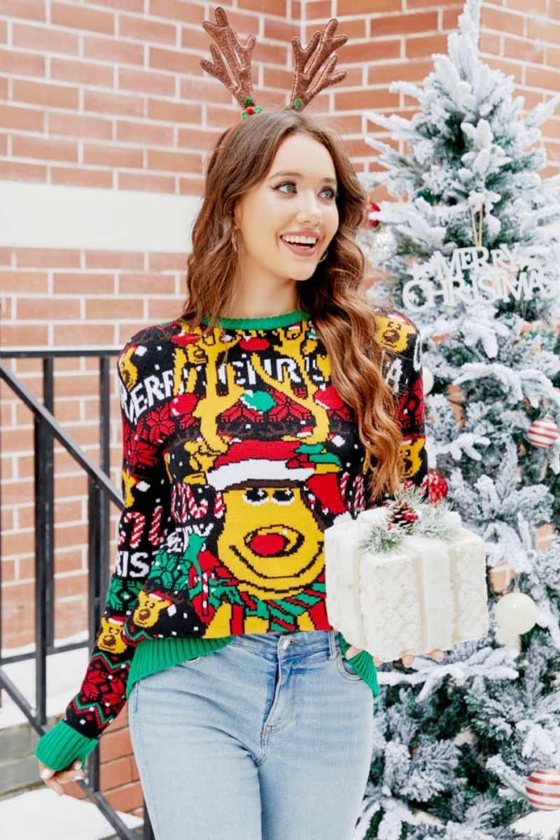Pull de Noël avec dessin animé de renne