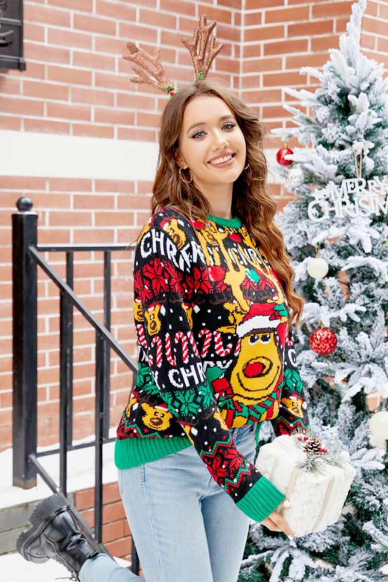 Pull de Noël avec dessin animé de renne