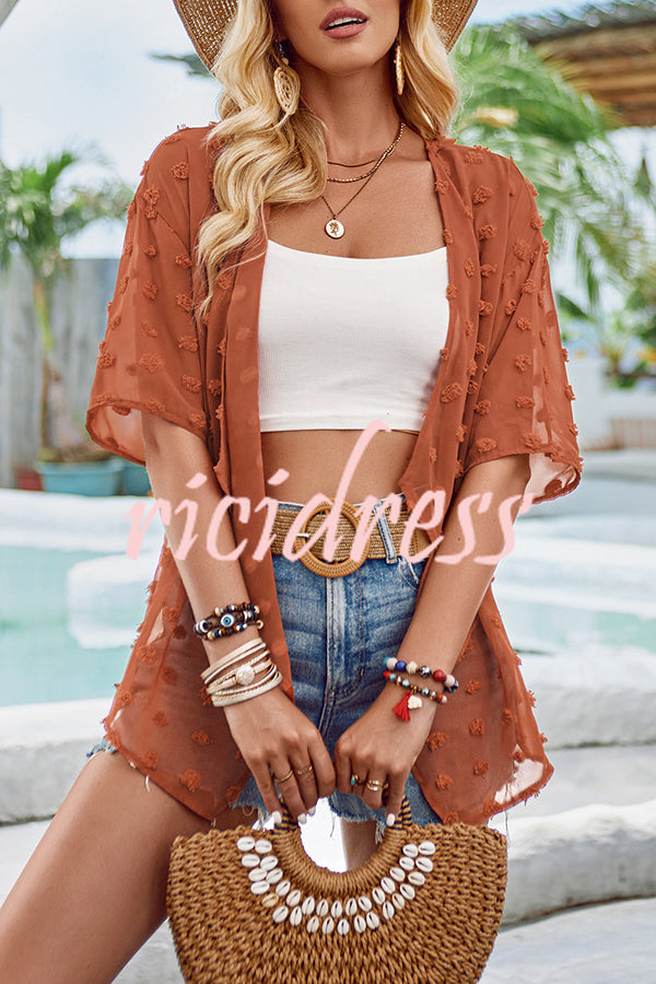 durchsichtiger Überwurf mit Patchwork-Pom-Pom-Ärmeln