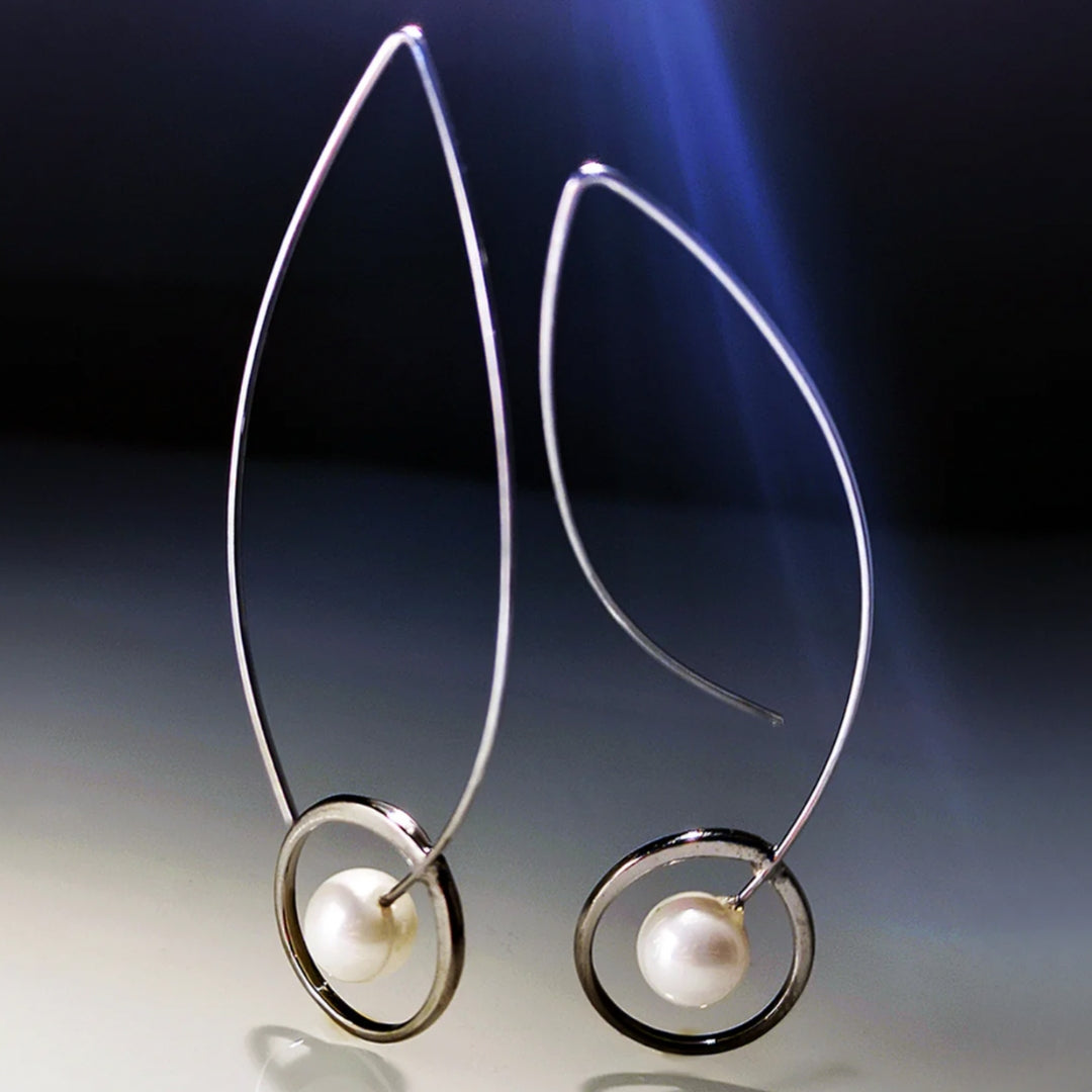 Boucles d'oreilles bohèmes en argent avec perles