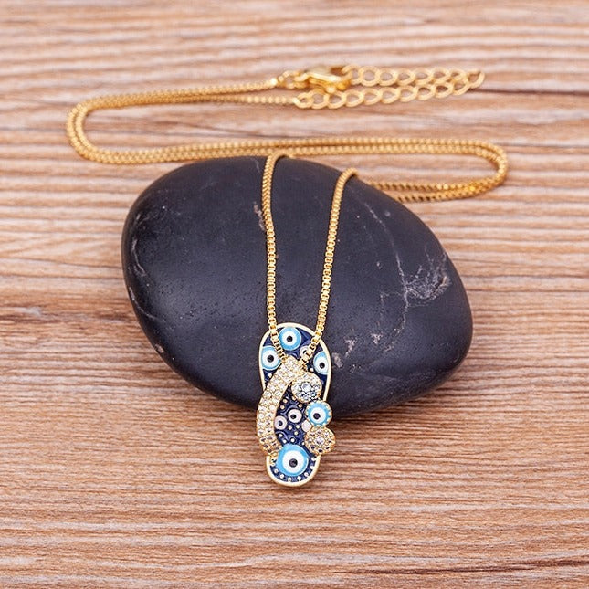 Pendentif tong Nazar en or