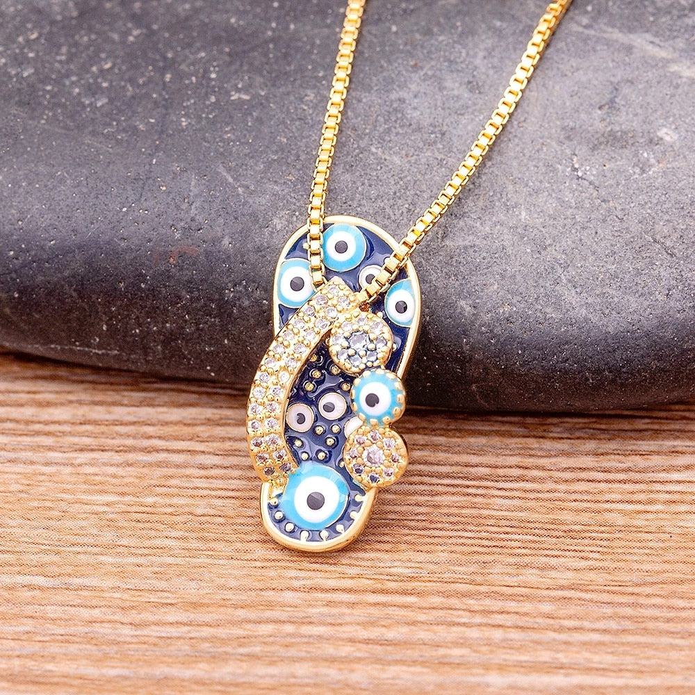 Pendentif tong Nazar en or