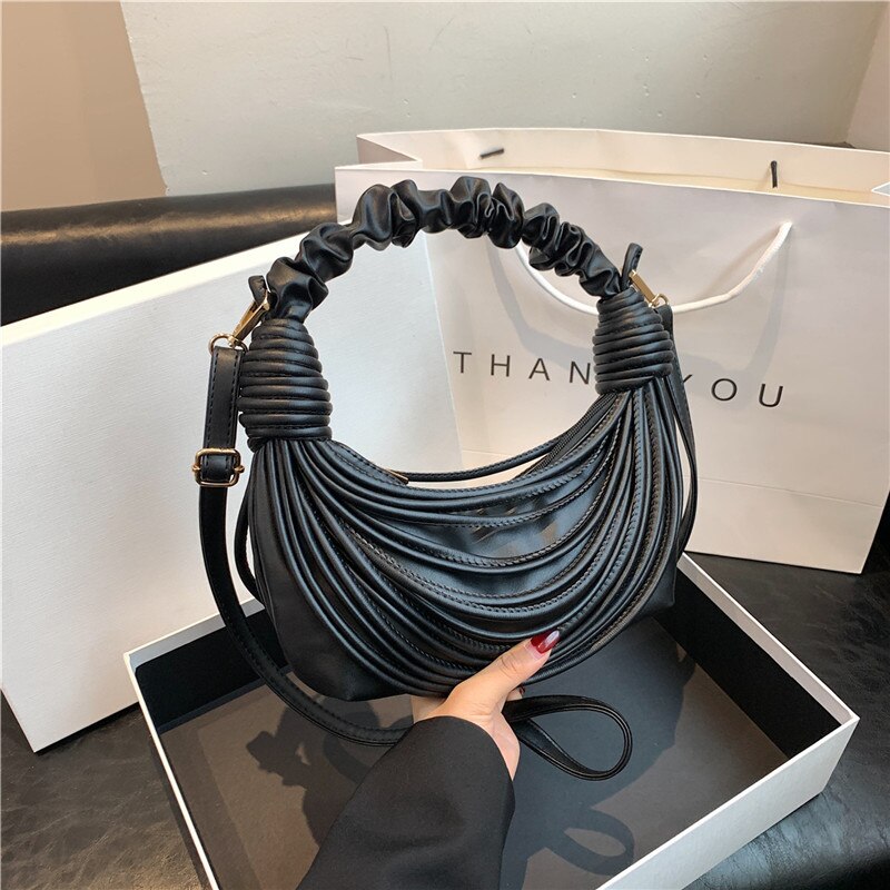 Pochette tressée Bellachicha avec câble électrique