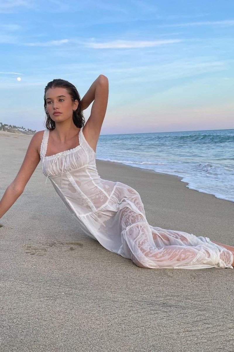 Anastasia – Robe longue semi-transparente à volants