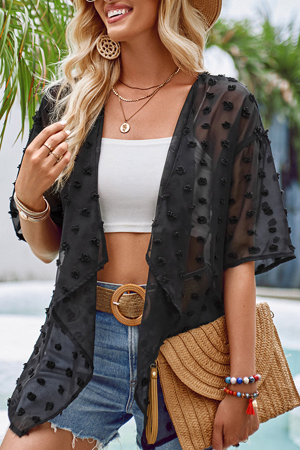 durchsichtiger Überwurf mit Patchwork-Pom-Pom-Ärmeln