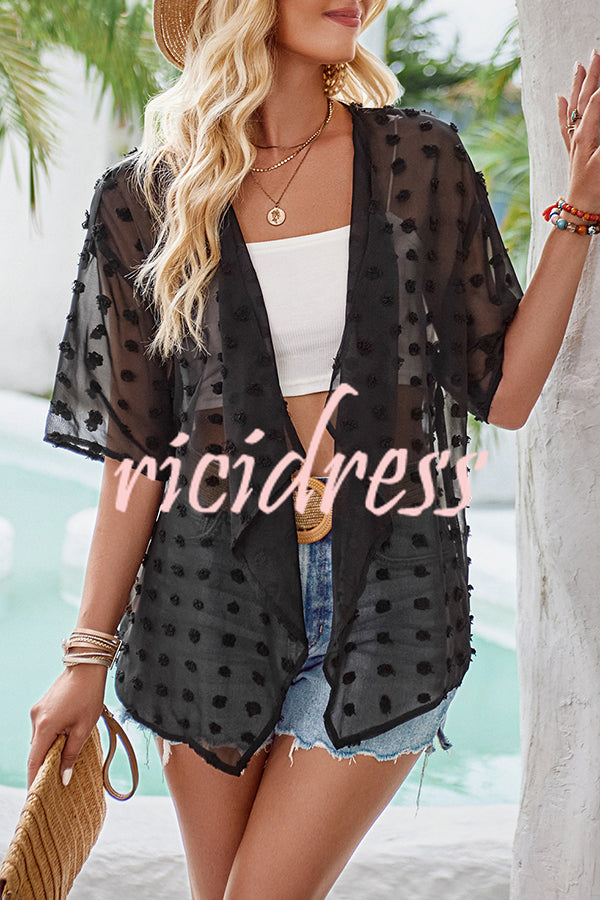 durchsichtiger Überwurf mit Patchwork-Pom-Pom-Ärmeln