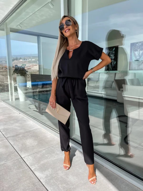 Kurzärmliger Jumpsuit mit V-Ausschnitt, Einstecktasche und elastischer Taille zum Binden in Bleistifthosen