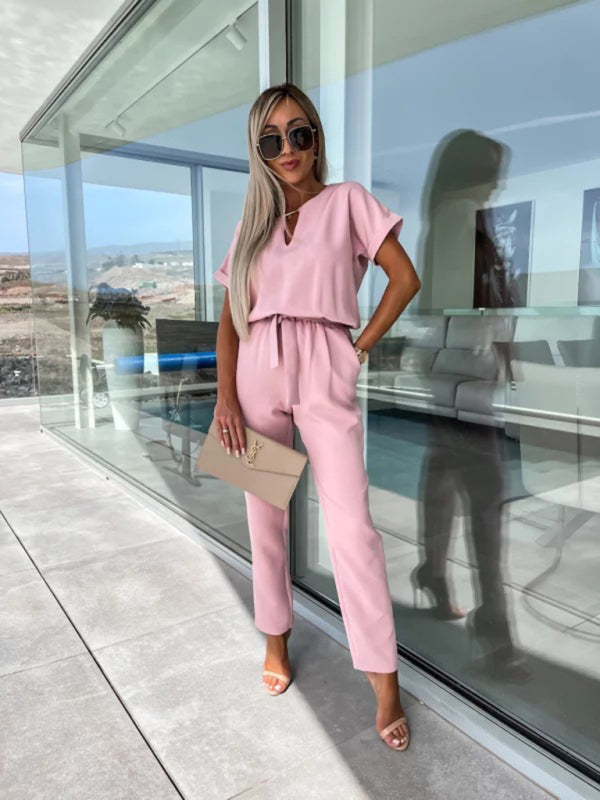 Kurzärmliger Jumpsuit mit V-Ausschnitt, Einstecktasche und elastischer Taille zum Binden in Bleistifthosen