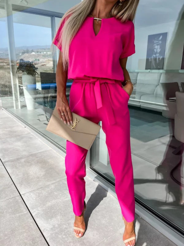 Kurzärmliger Jumpsuit mit V-Ausschnitt, Einstecktasche und elastischer Taille zum Binden in Bleistifthosen