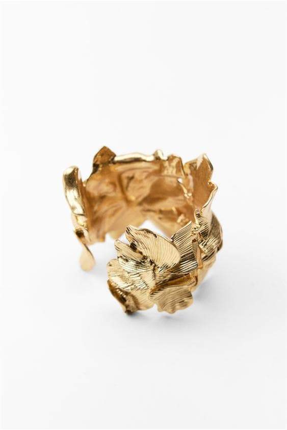 Bracelet à motif floral et structure métallique