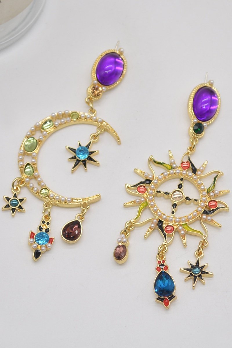 Boucles d'oreilles longues asymétriques avec soleil et lune