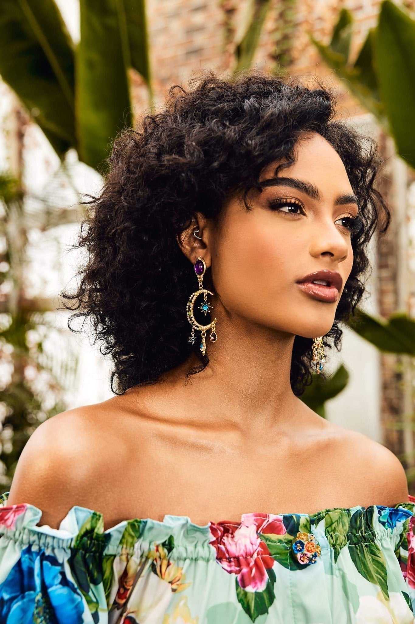 Boucles d'oreilles longues asymétriques avec soleil et lune