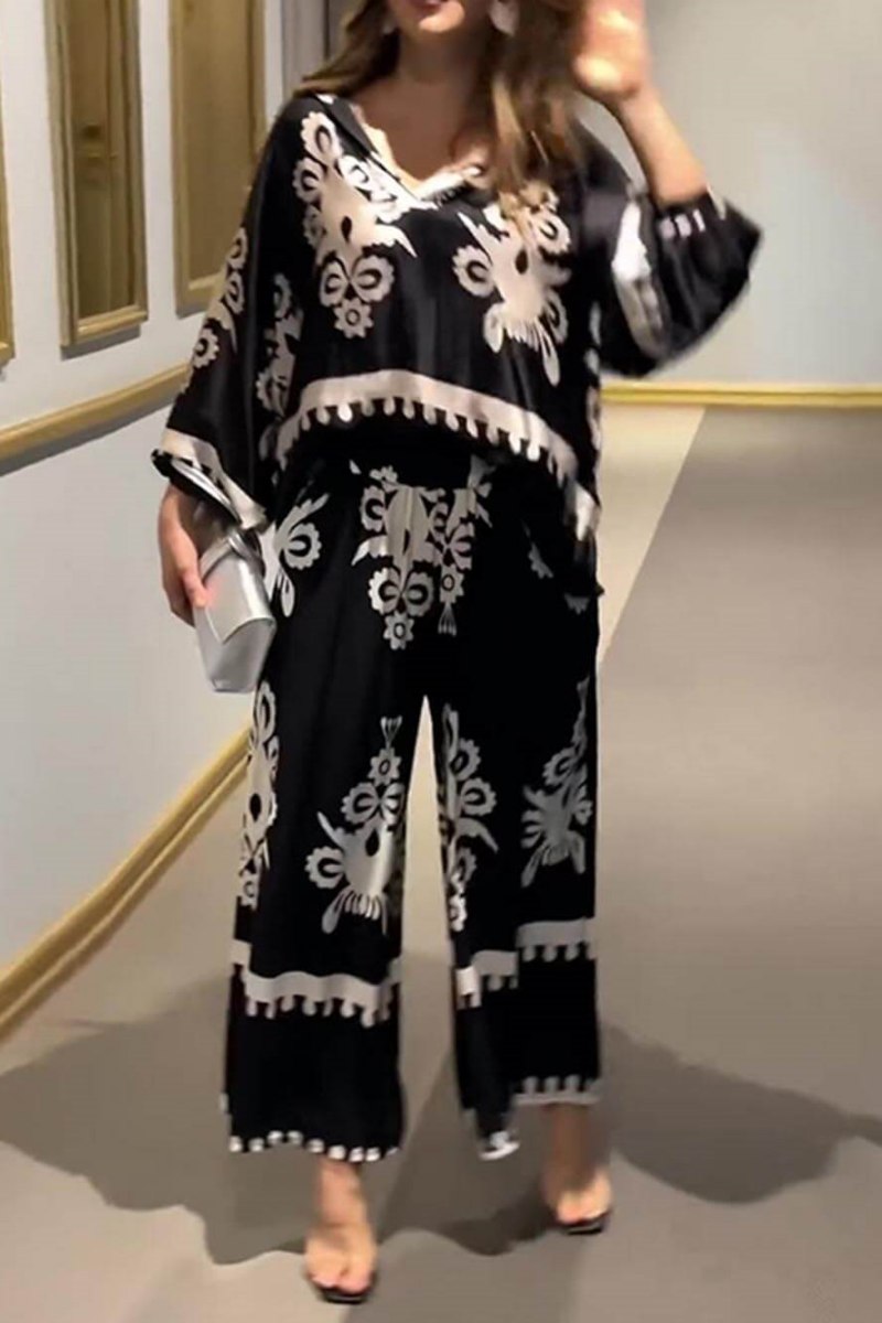 Ensemble imprimé unique avec haut à manches longues irrégulier et pantalon long