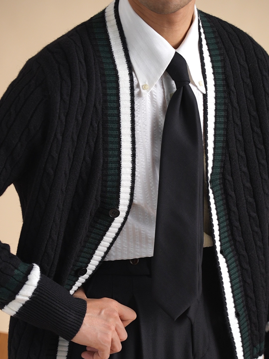 Cardigan en maille torsadée avec poignets contrastés