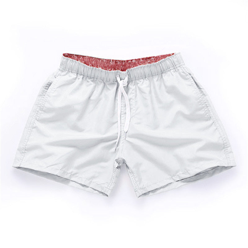 Short de plage de couleur unie pour homme