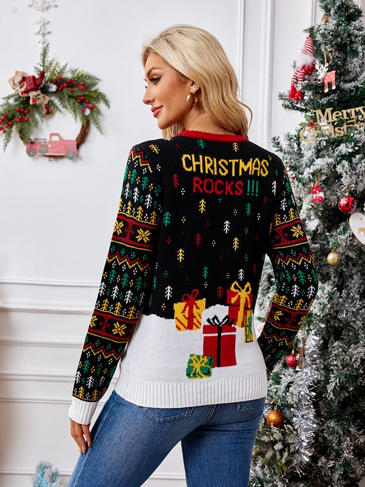 Pull col rond en maille avec broderie – Père Noël et notes de musique 