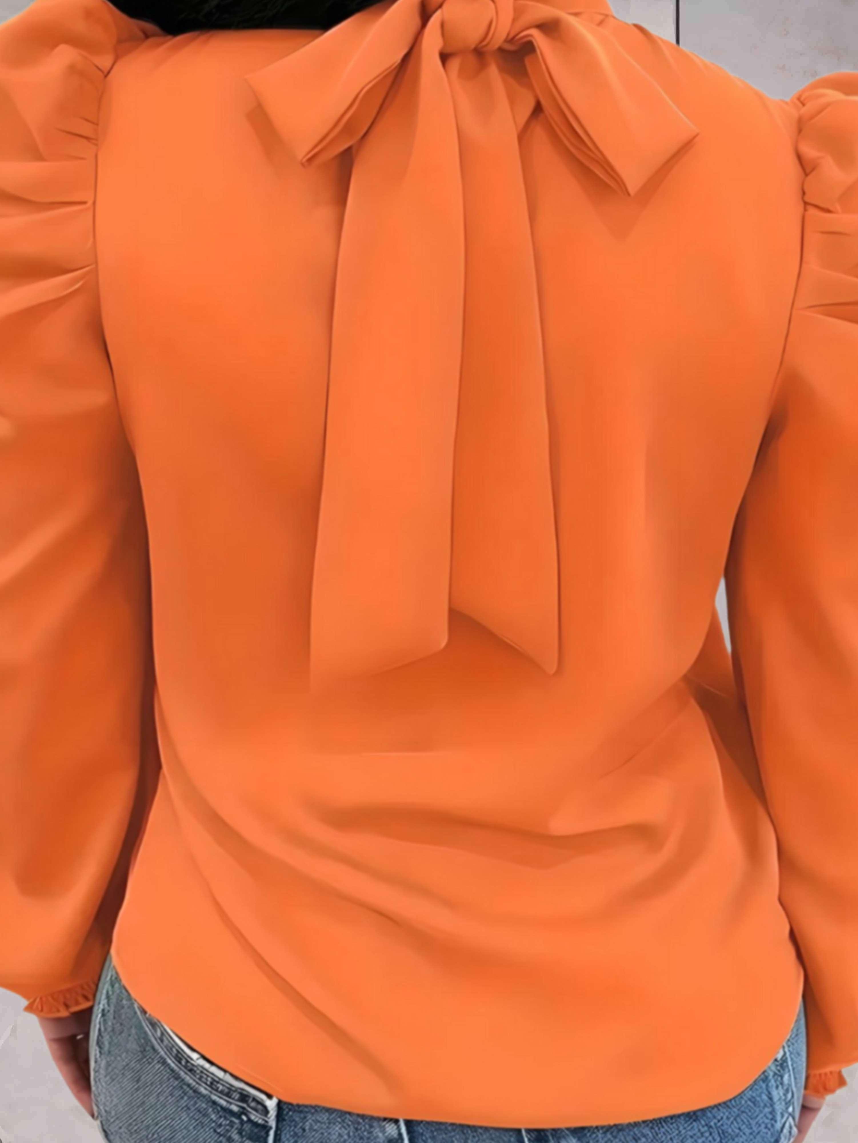 Bellachicha - Bluse mit Rollkragen und langen Puffärmeln