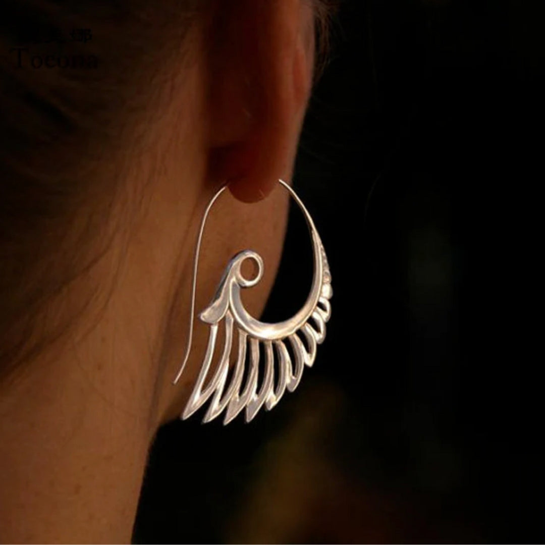 Boucles d'oreilles ailes en or 