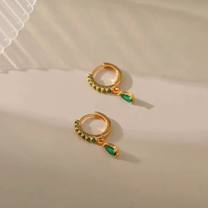 Boucles d'oreilles en zircone avec émeraude en or 