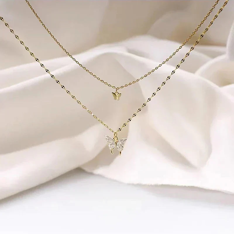 Lina - Collier superposé avec pendentifs papillon