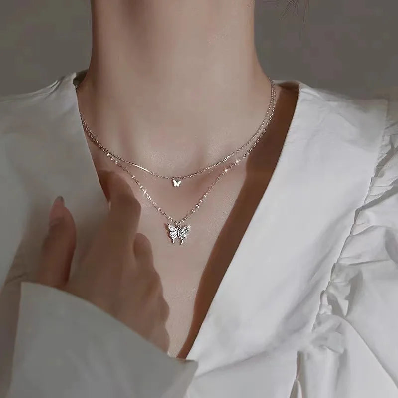 Lina - Collier superposé avec pendentifs papillon
