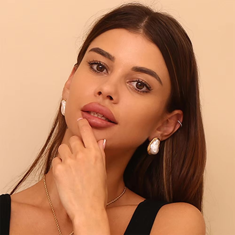 Clous d'oreilles en perles baroques