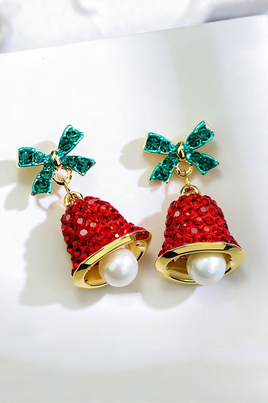Boucles d'oreilles avec nœud et cloches de Noël