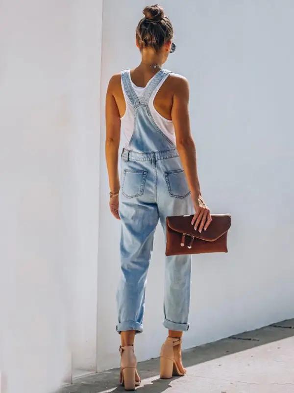 Salopette en jean déchirée et délavée pour femme en bleu 