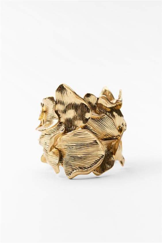 Bracelet à motif floral et structure métallique