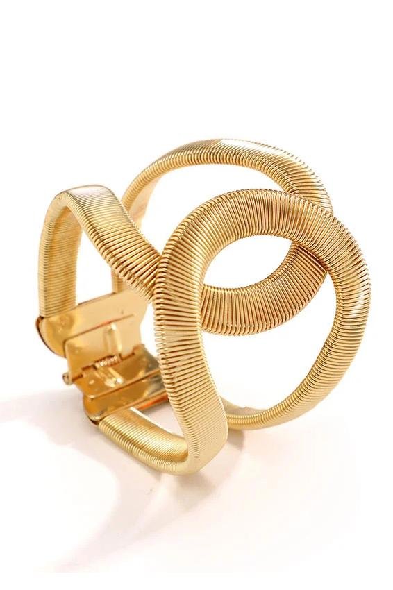 Bracelet à motif géométrique et structure métallique