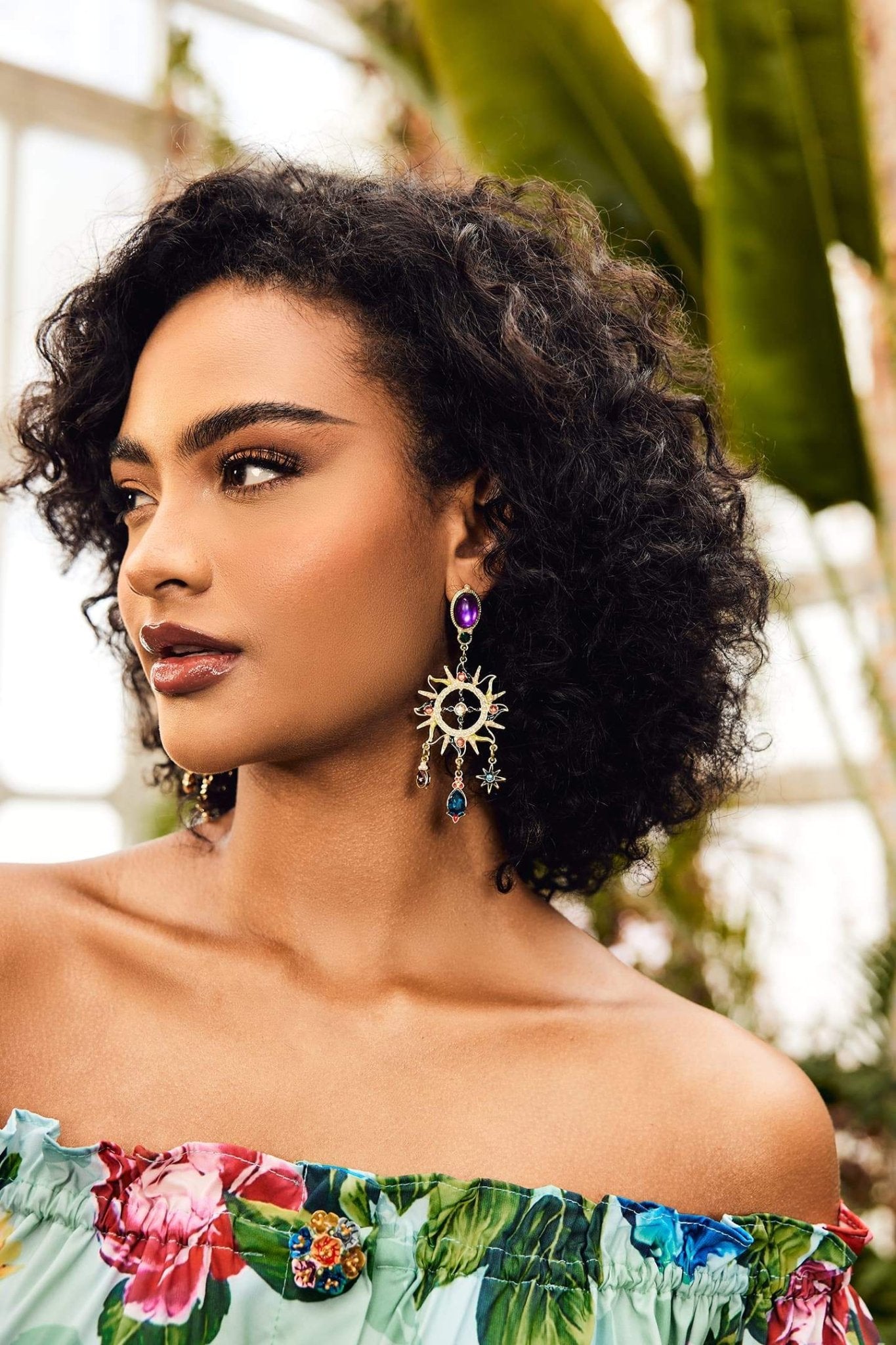 Boucles d'oreilles longues asymétriques avec soleil et lune